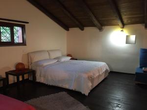 Postel nebo postele na pokoji v ubytování Chalet Etna