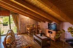 Μια τηλεόραση ή/και κέντρο ψυχαγωγίας στο Casa Rural La Campana Con o sin Ático