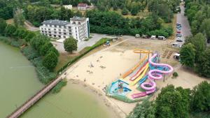 an aerial view of a water park with a roller coaster at Rezydencja Margonin in Margonin
