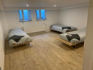 Postel nebo postele na pokoji v ubytování Vogelnest