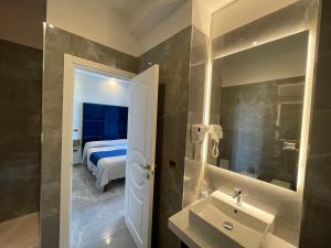 Koupelna v ubytování Ninfa hotel + 37 fotografií