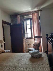 A bed or beds in a room at B&B L'amaca della felicità
