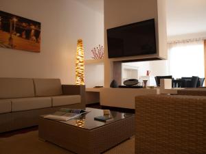 TV a/nebo společenská místnost v ubytování Hotel Garibaldi