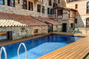 Bazén v ubytování Costa Esmeralda Suites nebo v jeho okolí