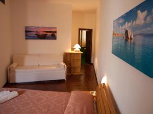 Postel nebo postele na pokoji v ubytování Hotel Garibaldi