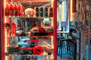 a display case in a store with snowboards in it at Costa Esmeralda Suites in Suances