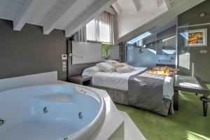 Voodi või voodid majutusasutuse Costa Esmeralda Suites toas