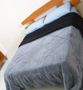 Cama ou camas em um quarto em Cantinho do Sossego III - Com Lareira