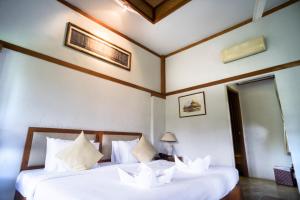 Lova arba lovos apgyvendinimo įstaigoje Belle Villa Resort, Pai