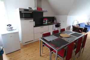 Kuchyň nebo kuchyňský kout v ubytování Chambre d'hôte Blankenberge