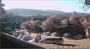 a van parked in front of a group of tents at Camping Aviator Busteni, Parcela campare Corturi in Buşteni