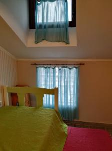 Postel nebo postele na pokoji v ubytování Palm Garden Villa