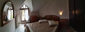 Postel nebo postele na pokoji v ubytování Palm Garden Villa