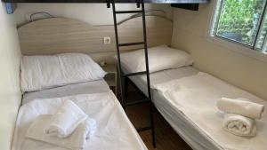 Postel nebo postele na pokoji v ubytování Laguna Mobile Homes