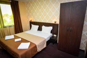 A bed or beds in a room at Guest house VRAZHDEBNA