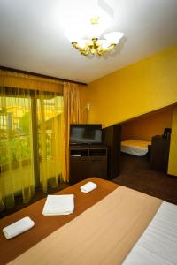 A bed or beds in a room at Guest house VRAZHDEBNA
