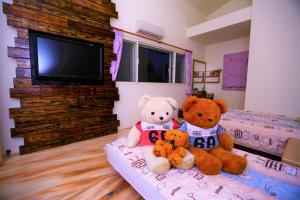 TV o dispositivi per l'intrattenimento presso 鄉間雅築休閒民宿Country Villa Homestay