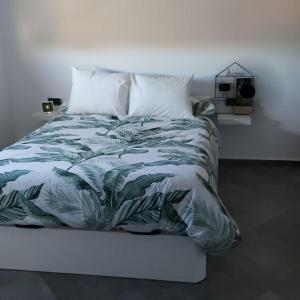 Ein Bett oder Betten in einem Zimmer der Unterkunft Casa ARONA