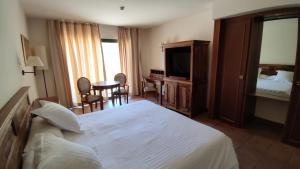 Posteľ alebo postele v izbe v ubytovaní La Figuerola Hotel & Restaurant