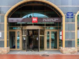 an entrance to a building with two revolving doors at Ibis St Petersburg Centre in Saint Petersburg