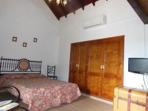 Postel nebo postele na pokoji v ubytování Casa Rural Aborigen Bimbache