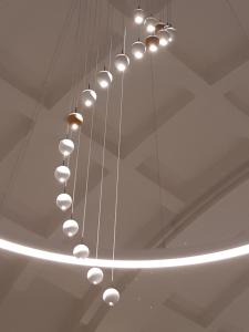 a chandelier hanging from a ceiling in a room at The Gold Bank in Prague