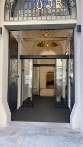 an entrance to a building with two revolving doors at The Gold Bank in Prague