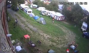 an aerial view of a group of tents and a campsite at Camping Aviator Busteni, Parcare rulota termen lung (6-12 luni). in Buşteni +13 photos