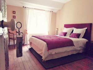 Ein Bett oder Betten in einem Zimmer der Unterkunft Le Mont Saint Laurent