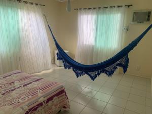 Ένα ή περισσότερα κρεβάτια σε δωμάτιο στο CASA LAGOA DO BANANA/CUMBUCO