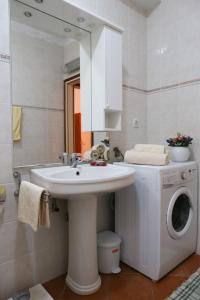 Kúpeľňa v ubytovaní Apartment Gitara