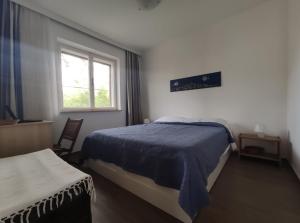 Posteľ alebo postele v izbe v ubytovaní Holiday Home Anja