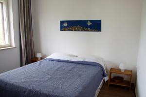 Posteľ alebo postele v izbe v ubytovaní Holiday Home Anja