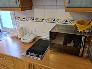Kuchyň nebo kuchyňský kout v ubytování Apartamento San Sebastián de la Gomera