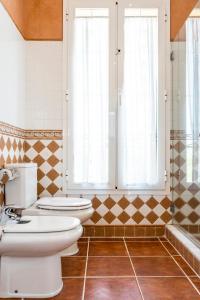 Kúpeľňa v ubytovaní Villa Playa Felostal