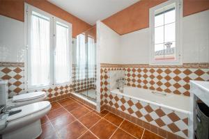 Kúpeľňa v ubytovaní Villa Playa Felostal