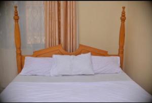 Postelja oz. postelje v sobi nastanitve Nile Estates Villa Kiwatule