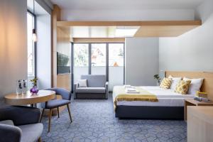 Posteľ alebo postele v izbe v ubytovaní Kamieniec 27 Bed & Breakfast