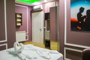 Katil atau katil-katil dalam bilik di Hotel Golden