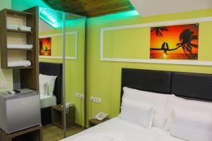 Katil atau katil-katil dalam bilik di Hotel Golden