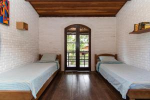 Postel nebo postele na pokoji v ubytování Casa Tranquila