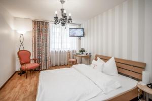 Voodi või voodid majutusasutuse Hotel Roter Turm toas