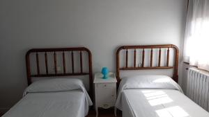Ένα ή περισσότερα κρεβάτια σε δωμάτιο στο MyM