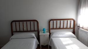 Postel nebo postele na pokoji v ubytování MyM