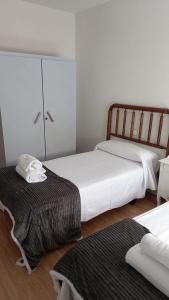 Postel nebo postele na pokoji v ubytování MyM