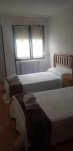 Postel nebo postele na pokoji v ubytování MyM