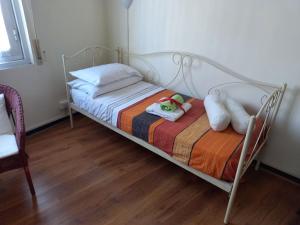 A bed or beds in a room at Il Riposo del Guerriero Guesthouse