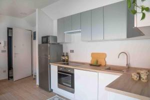 A kitchen or kitchenette at Stay Veszprèm, modern city center flat