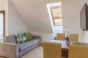 A television and/or entertainment centre at Stay Veszprèm, modern city center flat