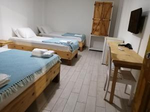 Postel nebo postele na pokoji v ubytování merih butik hotel